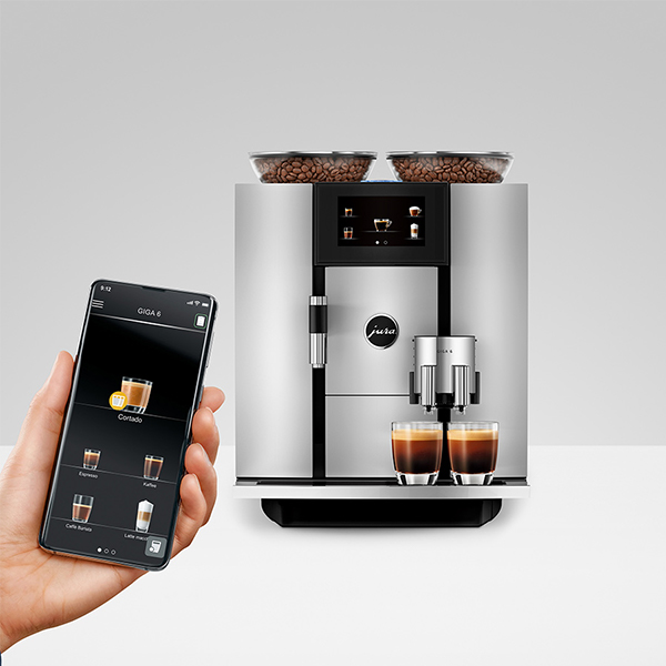 Smartphone verbonden met een JURA koffiemachine